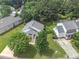 Aerial view of the home showcasing the front and back yards, driveway, and neighborhood at 202 Homestead Park Dr, Apex, NC 27502