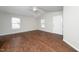 Bright living room with sleek, modern floors, neutral walls, and natural light at 202 Homestead Park Dr, Apex, NC 27502