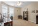 Bright bedroom featuring large windows, neutral walls, and an inviting desk area with chair at 228 Ellisview Dr, Cary, NC 27519
