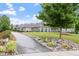 Charming single story home featuring a well-manicured lawn and beautiful landscaping and driveway at 228 Ellisview Dr, Cary, NC 27519