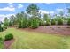 Expansive grounds with mature trees provide a serene and peaceful setting at 228 Ellisview Dr, Cary, NC 27519