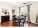 Cozy dining area with a round table, modern decor, and natural light at 2301 Laurel Valley Way, Raleigh, NC 27604