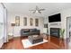 Stylish living room features a fireplace, hardwood floors, and comfortable seating at 2301 Laurel Valley Way, Raleigh, NC 27604