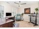 Office with carpet, large desk, modern chair, and decorative art at 2301 Laurel Valley Way, Raleigh, NC 27604