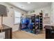 bedroom featuring a bunk bed, desk area with gaming setup, and superhero decor at 2426 Heron Watch Pl, Fuquay Varina, NC 27526