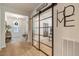 Elegant entryway featuring sliding glass doors and stylish decor at 2426 Heron Watch Pl, Fuquay Varina, NC 27526