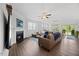 Inviting living room with a fireplace, plush seating, and a cozy atmosphere at 247 Axis Deer Ln, Garner, NC 27529