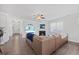 Bright living room featuring a fireplace, cozy seating, and neutral decor at 247 Axis Deer Ln, Garner, NC 27529