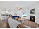 Spacious living room showcasing a fireplace, comfortable furniture, and modern finishes at 247 Axis Deer Ln, Garner, NC 27529