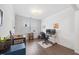 Home office with hardwood floors, lots of natural light, and a spacious desk area at 247 Axis Deer Ln, Garner, NC 27529