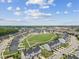 An aerial view of the neighborhood showcases the well-maintained lawns, sidewalks, and community green spaces at 260 Amber Acorn Ave, Raleigh, NC 27603