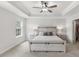 Bedroom with neutral paint, trey ceiling, and a ceiling fan at 260 Amber Acorn Ave, Raleigh, NC 27603