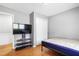 Bedroom with hardwood floors, fresh paint, and closet at 28 White Oak Dr, Smithfield, NC 27577