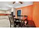 This dining room features ample seating with a bench and chairs, and a ceiling fan at 28 White Oak Dr, Smithfield, NC 27577