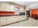 Kitchen with stainless steel appliances and a view to the dining area at 28 White Oak Dr, Smithfield, NC 27577