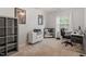 Bright room with carpet, gray cube storage and office furniture at 300 Gilman Ln # 101, Raleigh, NC 27610