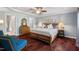 Comfortable bedroom featuring a ceiling fan, recessed lighting, and hardwood flooring at 3002 Bartlett Cir, Hillsborough, NC 27278