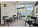 Relaxing screened porch with comfortable seating and outdoor views at 3002 Bartlett Cir, Hillsborough, NC 27278