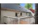 Exterior view showcasing the home's rear deck with string lights and freshly painted surfaces at 3016 Bolo Trl, Raleigh, NC 27615