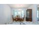 Dining room with wooden table and chairs next to a hutch at 3016 Hayling Dr, Raleigh, NC 27610