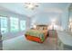 Bright and spacious bedroom with double windows and ceiling fan at 3016 Hayling Dr, Raleigh, NC 27610