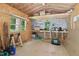 Interior of shed with windows, work bench, and outlets offering plenty of space for hobbies and tools at 305 Old School Rd, Chapel Hill, NC 27516