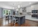 Spacious kitchen with a large island, stainless steel appliances, and a dining nook at 305 Springtree Circle Cir, Fuquay Varina, NC 27526