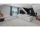 Inviting living room with plush seating, large windows with seating, and a view of the backyard at 305 Springtree Circle Cir, Fuquay Varina, NC 27526