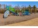 Community playground with climbing structures, slide and benches offers fun and entertainment at 305 Springtree Circle Cir, Fuquay Varina, NC 27526