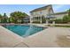 Inviting backyard pool with a seating and lounge area perfect for enjoying warm weather at 305 Springtree Circle Cir, Fuquay Varina, NC 27526