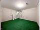 Large basement space with carpet and bright lighting, ready to be customized! at 307 Country Club Dr, Durham, NC 27712