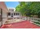 Back of house with large patio and outdoor entertaining area at 307 Country Club Dr, Durham, NC 27712