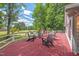 Spacious deck featuring plenty of seating with a beautiful backyard view at 307 Country Club Dr, Durham, NC 27712