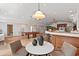 Recreation room featuring a dining table, pool table, and bar, perfect for entertaining guests at 307 Country Club Dr, Durham, NC 27712