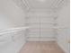 Walk-in closet with carpet and wire shelves and racking installed at 307 Country Club Dr, Durham, NC 27712