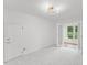 Spacious room showcasing recessed lighting, soft carpeting, French doors, and neutral decor at 314 Lane Rd, Dunn, NC 28334