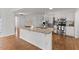 Granite countertops, stainless appliances, and hardwood floors are some of the many features of this kitchen at 314 Lane Rd, Dunn, NC 28334