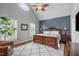 Spacious bedroom features a vaulted ceiling, a ceiling fan, large windows and a gorgeous bed at 321 Commons Walk Cir, Cary, NC 27519