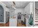 Modern kitchen includes stainless appliances, a center island, and light shaker cabinets at 321 Commons Walk Cir, Cary, NC 27519