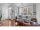 Sun-drenched living room features plenty of natural light and comfortable seating at 321 Commons Walk Cir, Cary, NC 27519