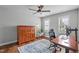 Office area with desk, chair, and a wall cabinet and hardwood floors at 321 Commons Walk Cir, Cary, NC 27519