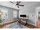 Office area with desk, chair, natural light, hardwood floors and ceiling fan at 321 Commons Walk Cir, Cary, NC 27519