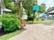 Large backyard with basketball hoop, patio and stairs to back door at 3810 Pendergrass St, Durham, NC 27704
