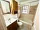The classic bathroom features a tub, vanity and tiling at 3810 Pendergrass St, Durham, NC 27704