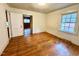 Sunny bedroom with wood floors at 3810 Pendergrass St, Durham, NC 27704