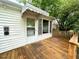 Wooden porch with windows and awning, offering a cozy outdoor space at 3810 Pendergrass St, Durham, NC 27704