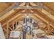 View of the attic showcasing its unfinished walls and ceiling at 4028 Winecott Dr, Apex, NC 27502