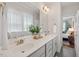 Well-lit bathroom with double vanity, modern fixtures, and stylish decor at 415 Dupree St, Durham, NC 27707
