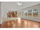 Open-concept living room leading to the kitchen and backyard at 4212 Auburn Hills Dr, Raleigh, NC 27616