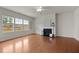 Bright living room featuring a fireplace and hardwood floors at 4212 Auburn Hills Dr, Raleigh, NC 27616
